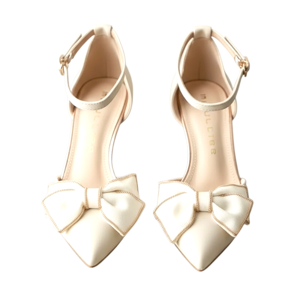 JASE Heart cream pointed-toe heels featuring a delicate bow detail and an adjustable ankle strap.