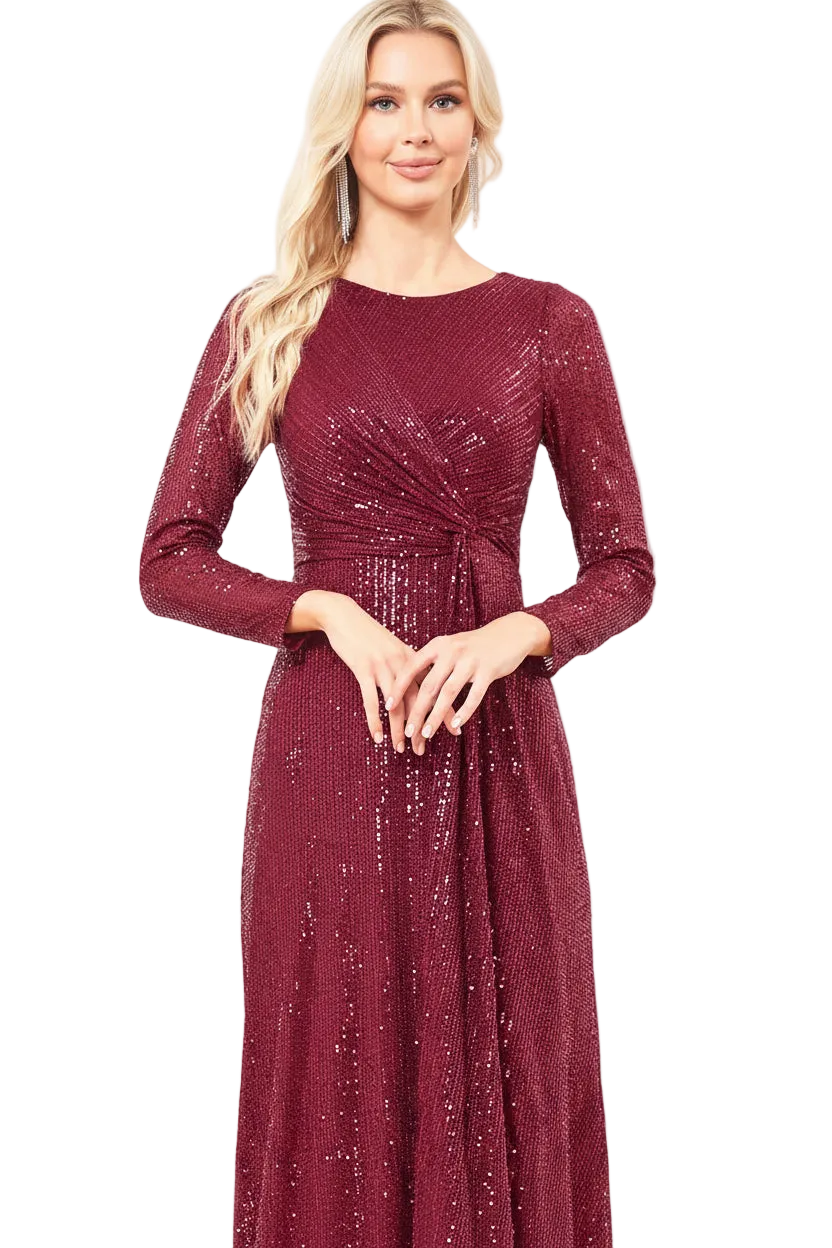A woman modeling a long-sleeve, floor-length burgundy sequined dress against a plain white background.