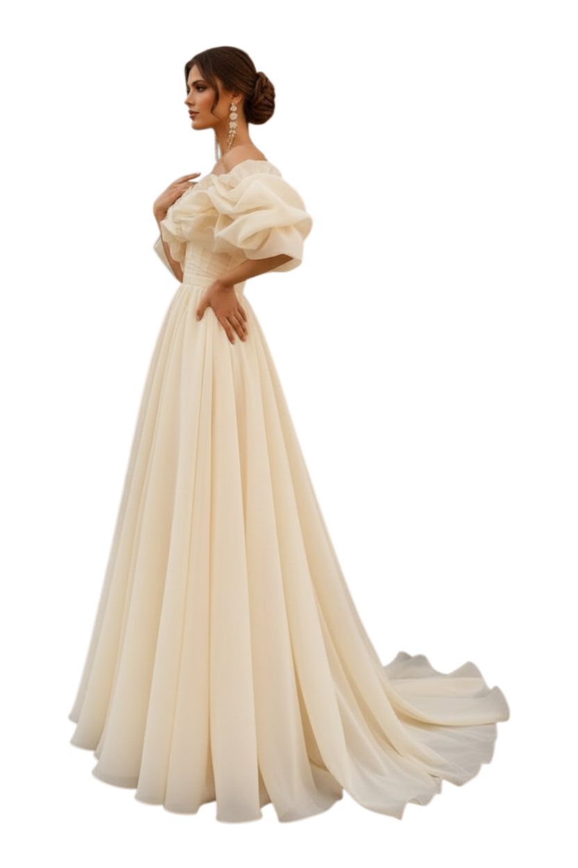 JASE Heart Ethereal Volante off-shoulder champagne gown with voluminous puff sleeves and a flowing floor-length skirt