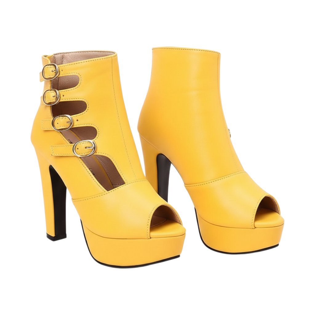 JASE Heart yellow platform gladiator ankle boots with peep toe and side buckle straps on a white background