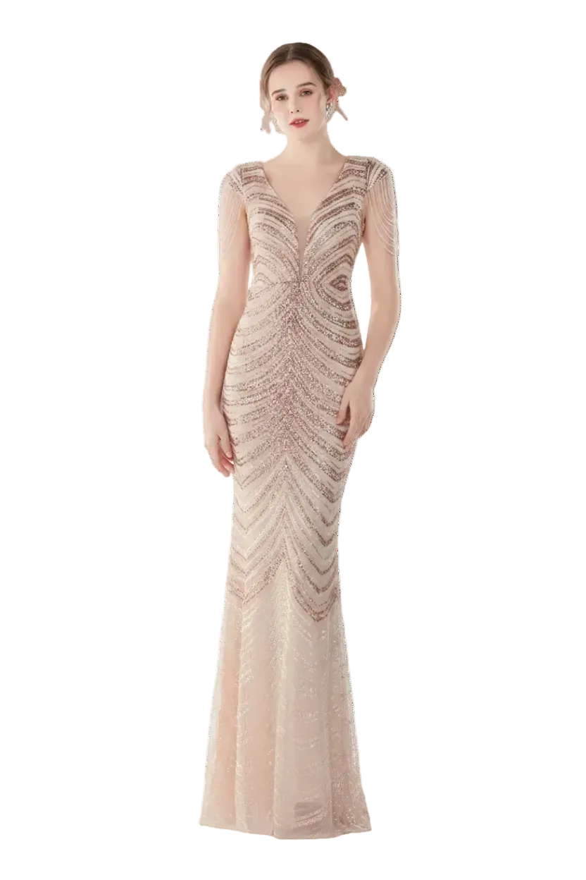 Woman wearing a long, elegant dress with a mirror in the background