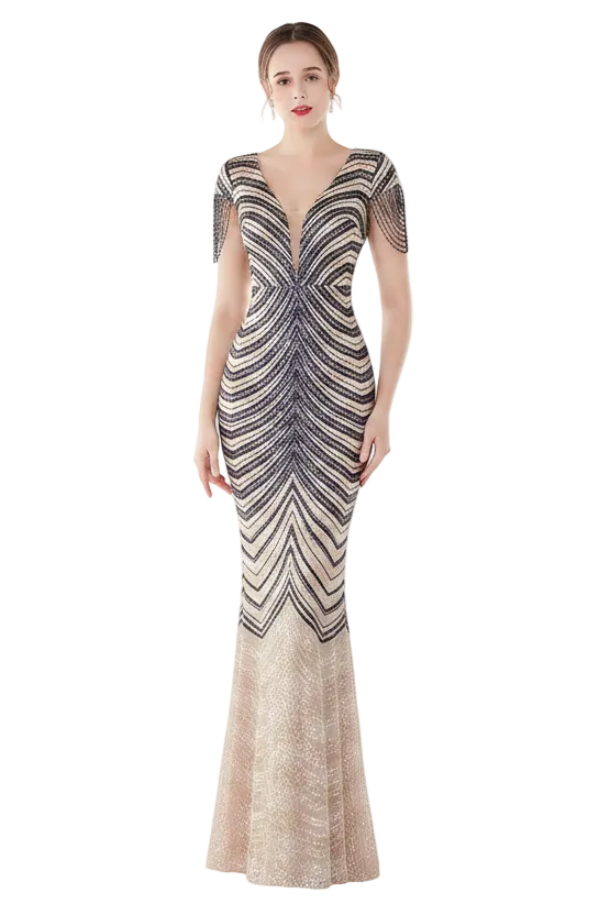 A woman modeling a floor-length evening gown with a deep V-neckline, short sleeves, and a fitted silhouette. The dress features a black and champagne beige wavy striped pattern with a solid champagne beige mermaid skirt.