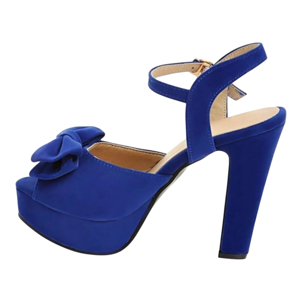 JASE Heart blue velvet platform high heels with a decorative bow and ankle strap, side view