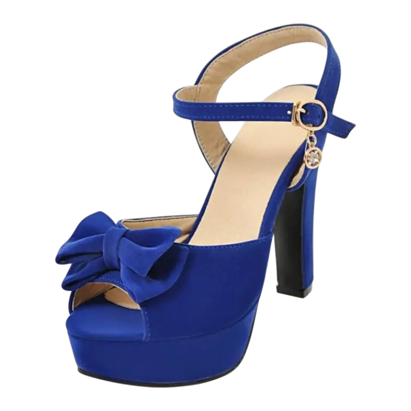 JASE Heart royal blue velvet platform high heels with a decorative bow and ankle strap featuring a charm