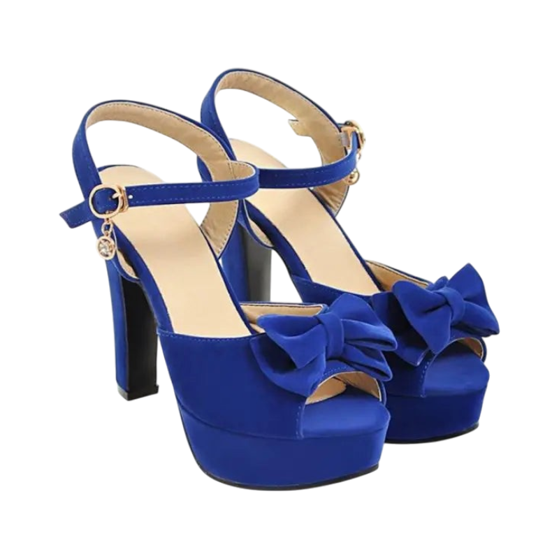 JASE Heart royal blue velvet platform heels with peep toe, bow detail, and adjustable ankle strap with charm