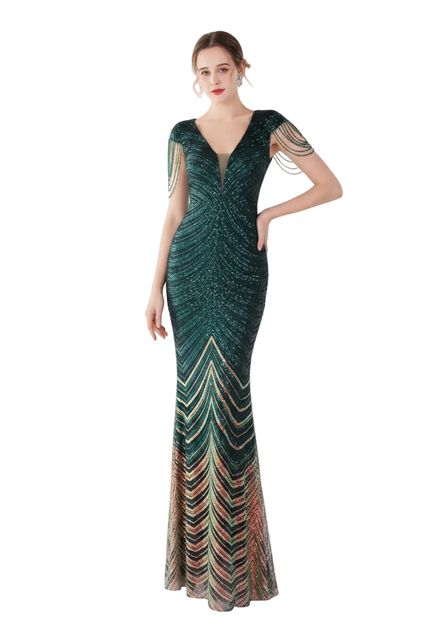 Woman wearing a green evening gown with a mirror reflection in the background