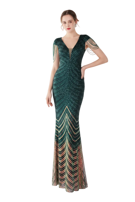 Woman wearing a green evening gown with a mirror reflection in the background