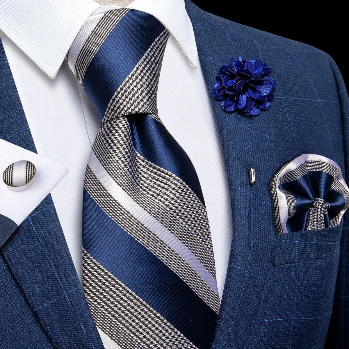 JASE HEART GLOBAL blue and silver striped silk necktie set with matching pocket square, lapel pin, and cufflinks.