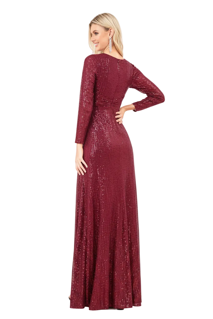 A woman modeling a floor-length burgundy sequined gown from the back, featuring long sleeves and a boat neckline, set against a plain white background.