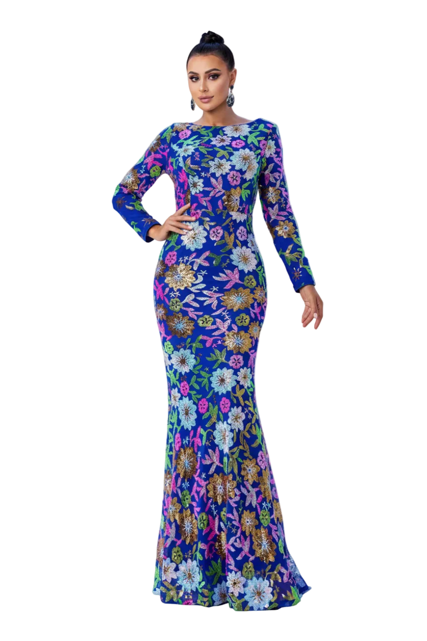 A woman modeling a long-sleeve floor-length mermaid gown with a vibrant multicolor floral print on a rich blue base, set against a plain white background.