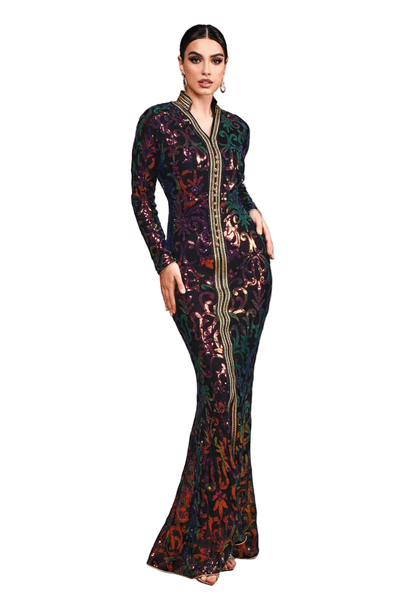 Woman in a patterned dress standing in desert sand dunes with 'Miss Qord' branding.