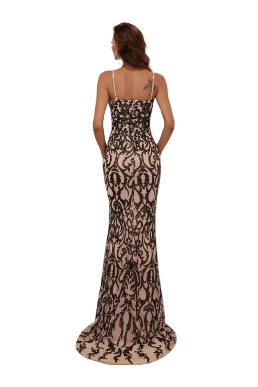 Woman wearing a black lace evening gown on a white background
