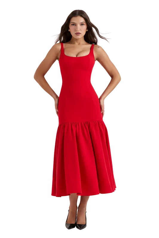 A woman modeling a bright red midi dress with a scoop neckline, thin shoulder straps, and a flared skirt, paired with black heels, set against a plain white background.