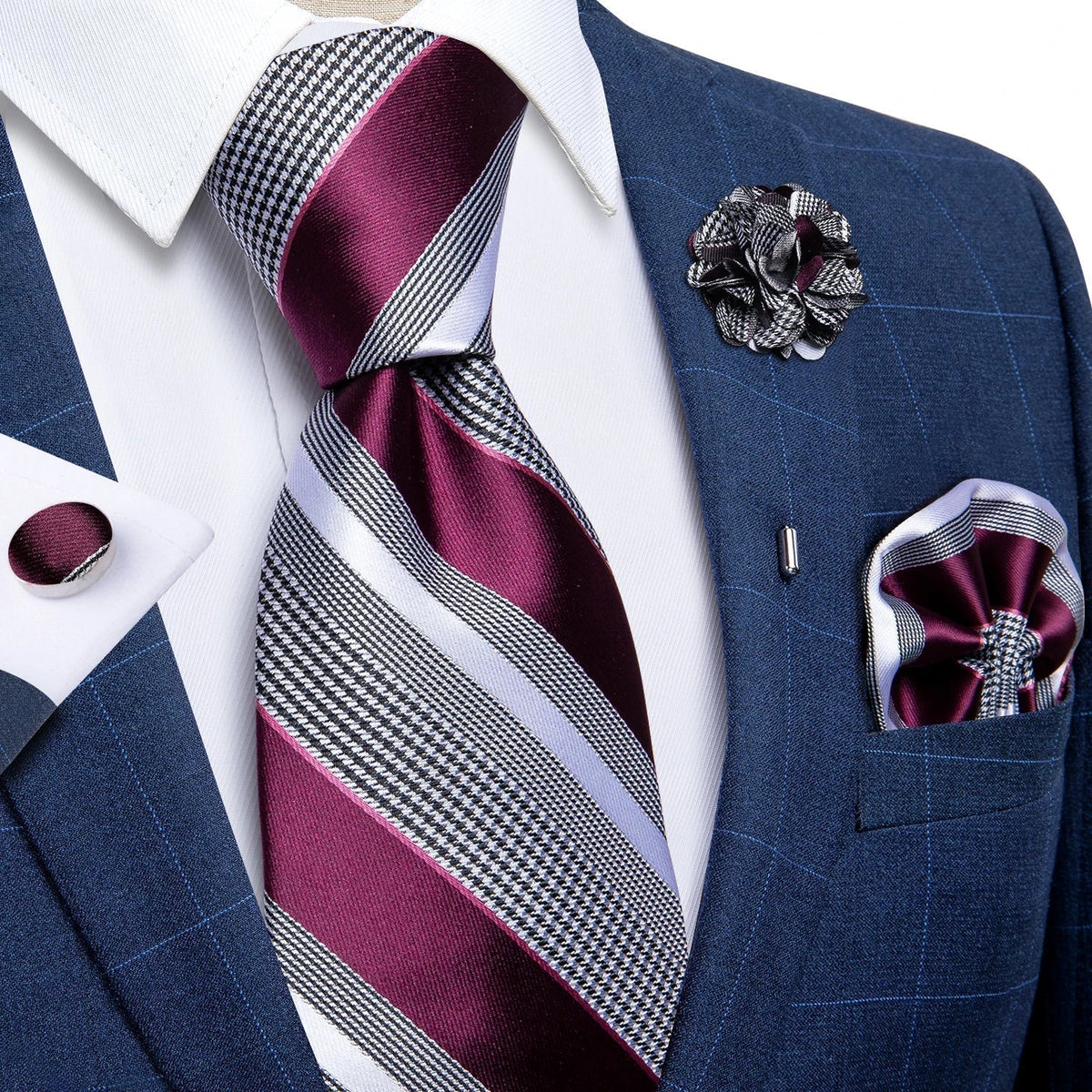 JASE HEART GLOBAL burgundy and grey striped silk necktie set with matching pocket square and lapel flower on suit