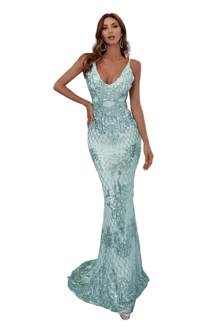Woman wearing a light blue evening gown in an elegant interior setting