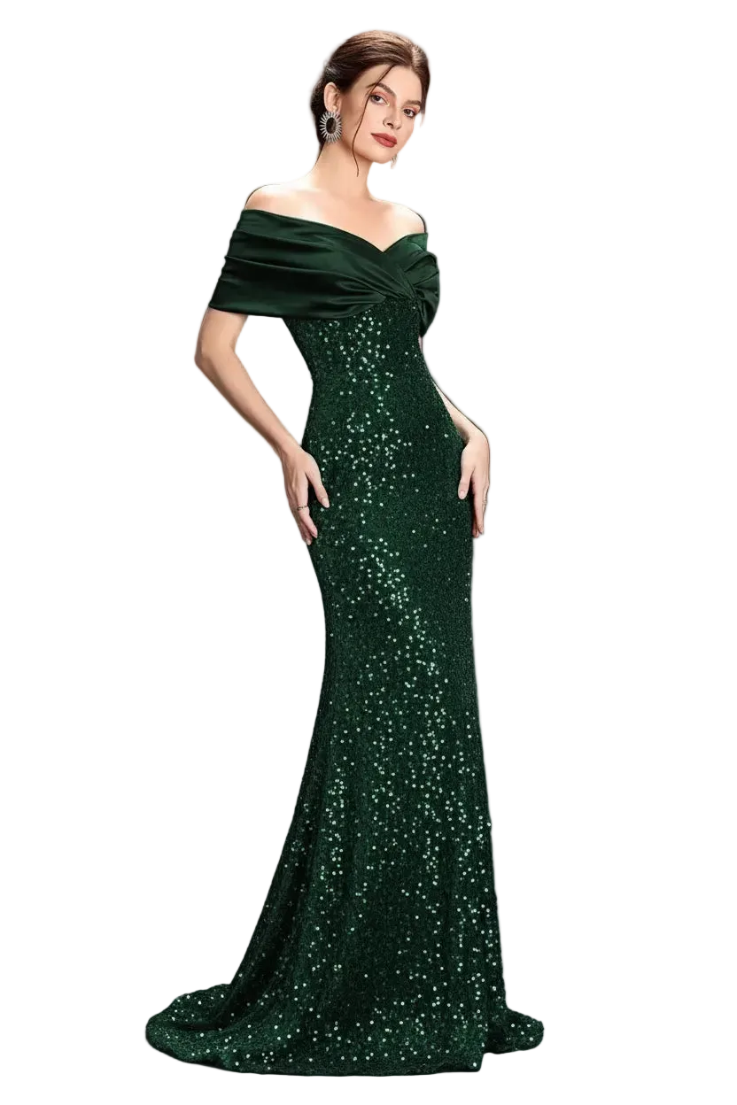 Woman wearing a green off-shoulder evening gown against a dark background