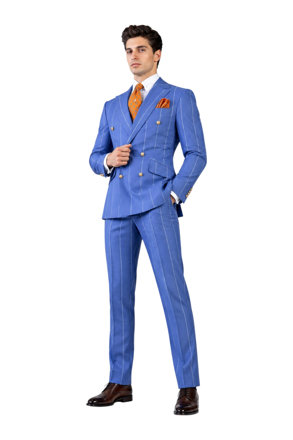 A man wearing a blue double-breasted pinstripe suit with a white shirt, orange patterned tie, and matching orange pocket square, posed against a textured gray background with a 'UA' logo in the top-left corner.