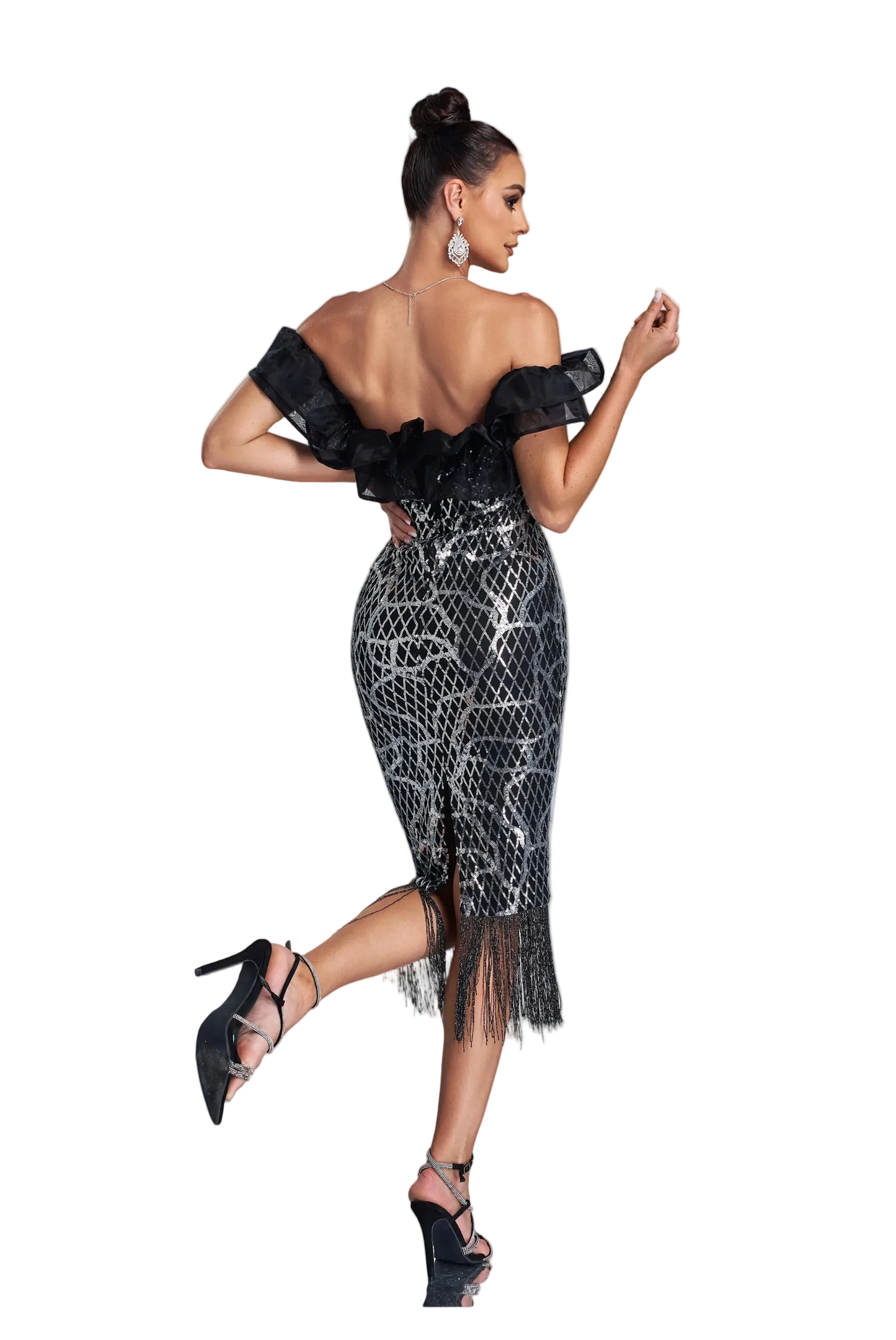Woman wearing a black and silver dress with intricate detailing on a white background