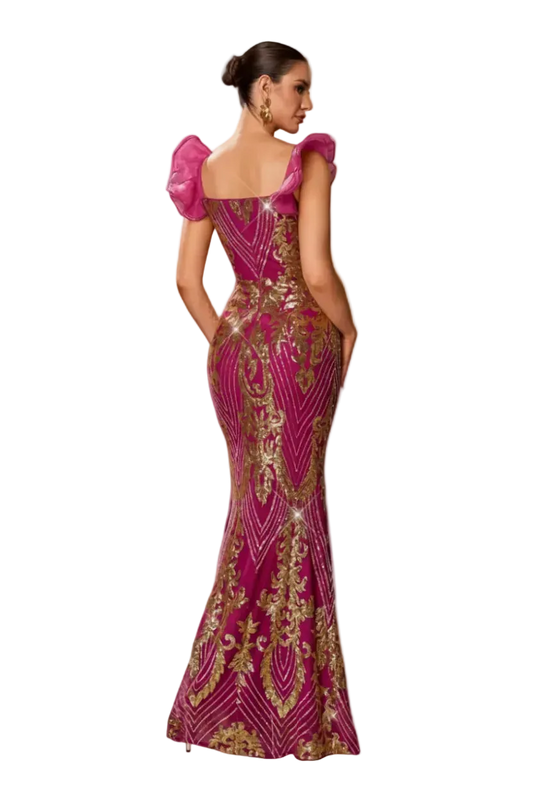 Woman wearing a pink and gold evening gown on a white background
