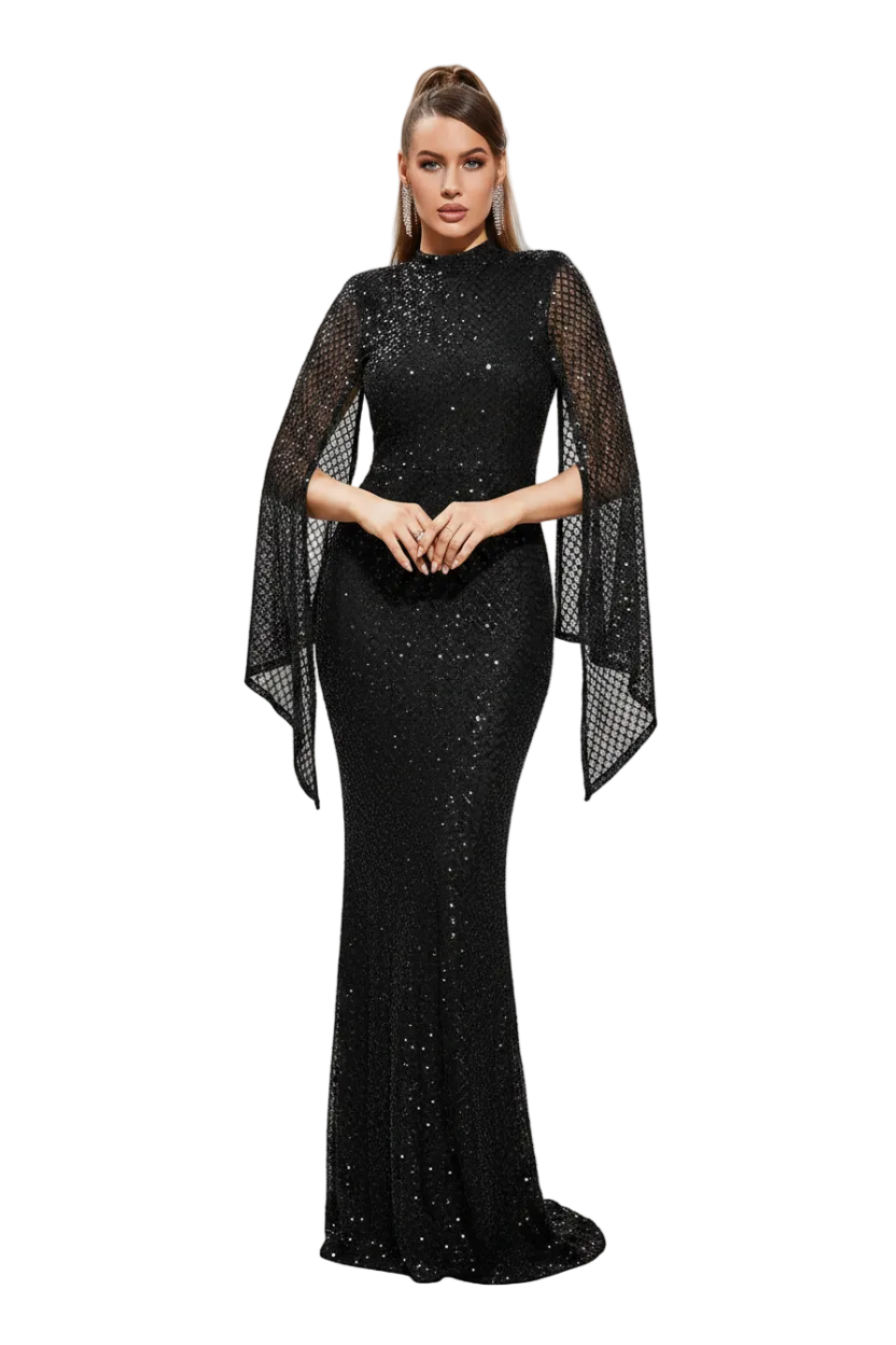 Woman wearing a black sequin dress with a matching shawl outdoors.