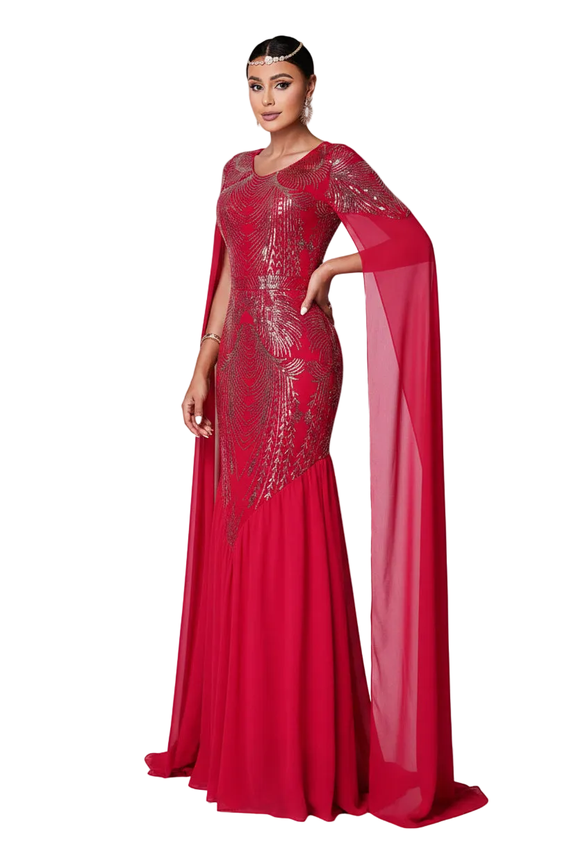 Woman wearing a red evening gown with a cape against a white background