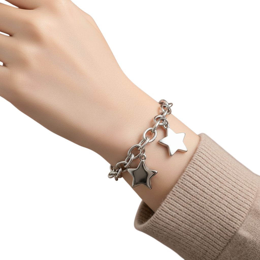 JASE HEART GLOBAL Luminous Starburst silver chain bracelet with two star charms worn on a wrist