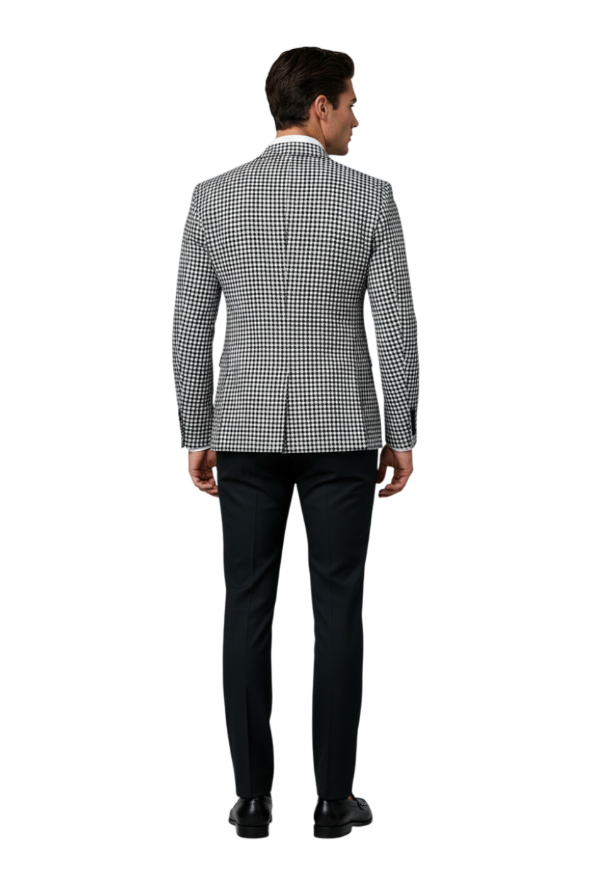 JASE Heart men's black and white houndstooth blazer worn with dark trousers, viewed from the back.